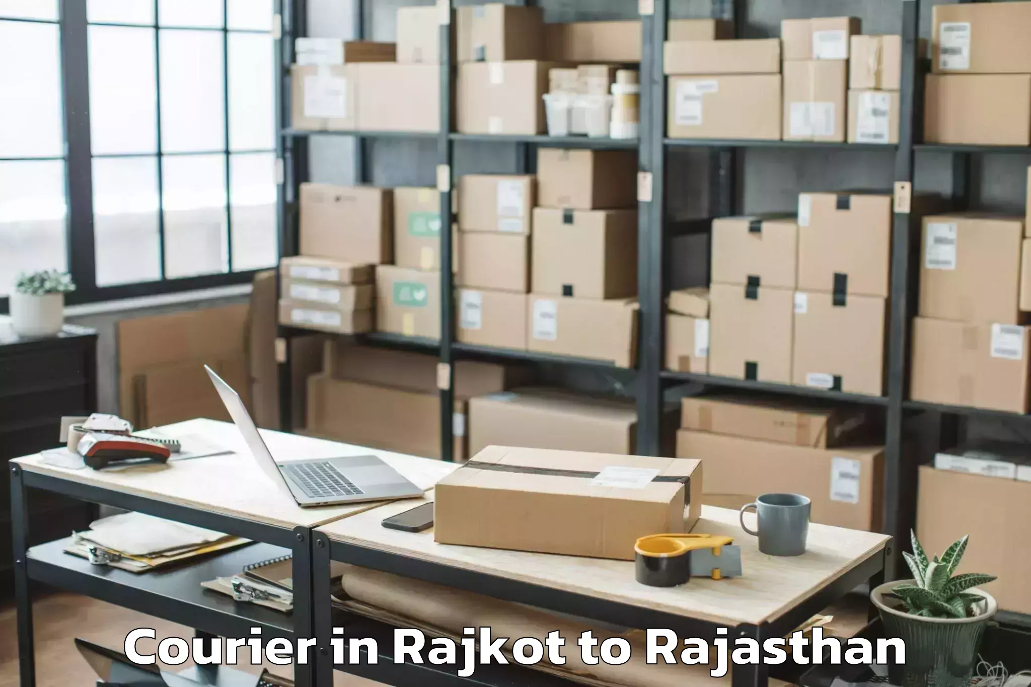 Leading Rajkot to Raisinghnagar Courier Provider